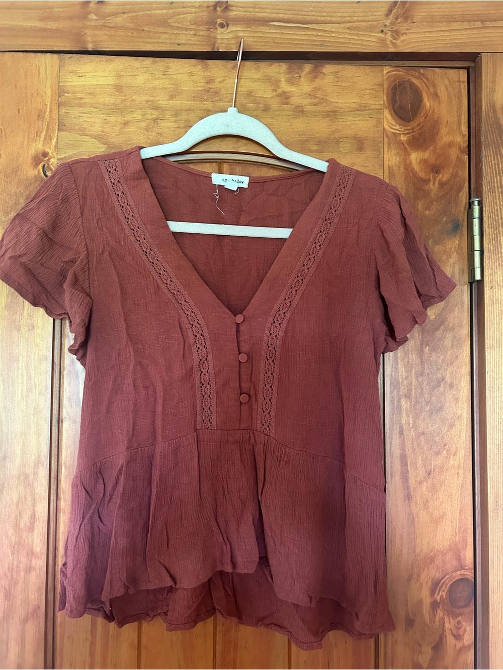 Eyeshadow Rust V-Neck Lace-Trim Peplum Blouse